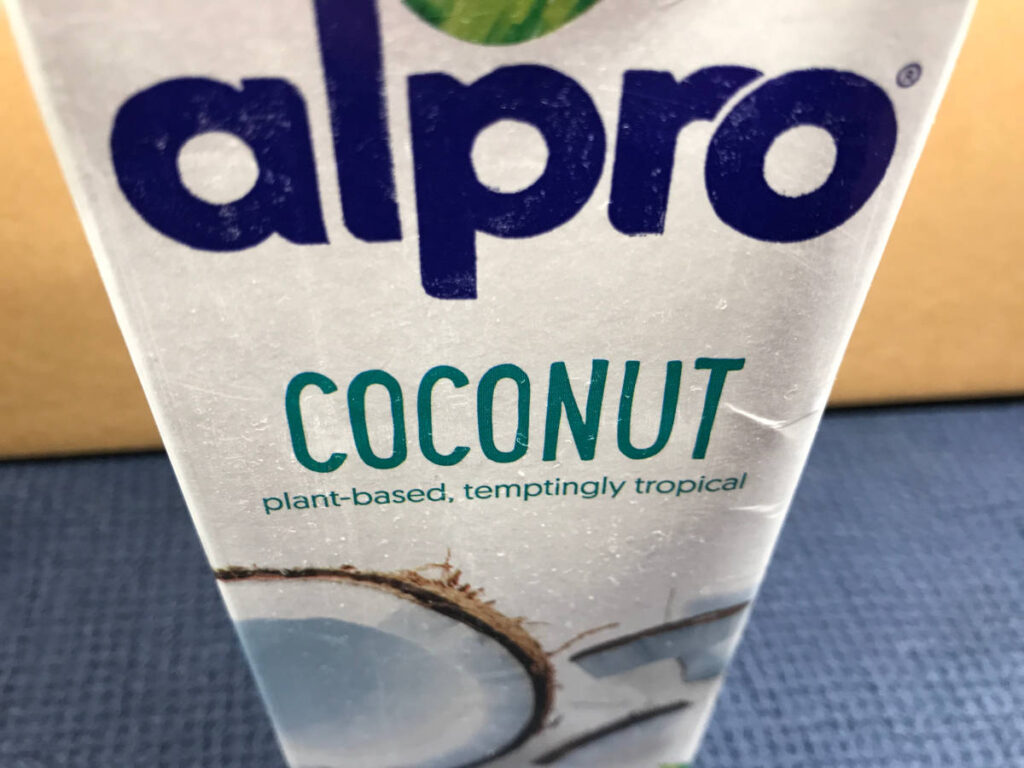 A carton of coconut milk, ready chilled.