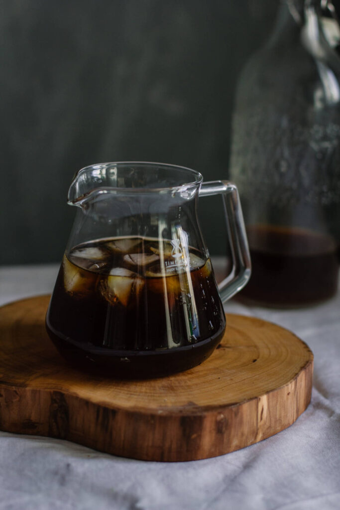 A jug of cold brew instant coffee with ice.