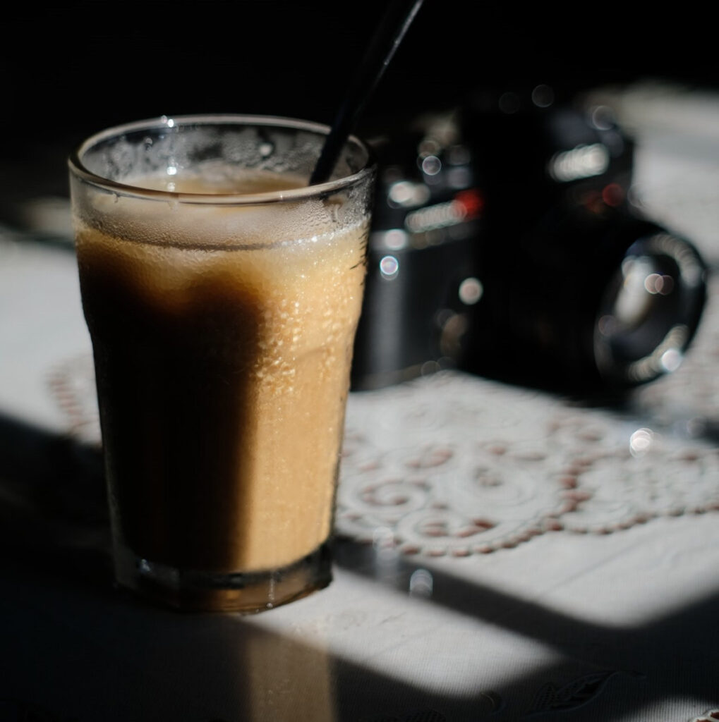 A frosted glass of iced latte.